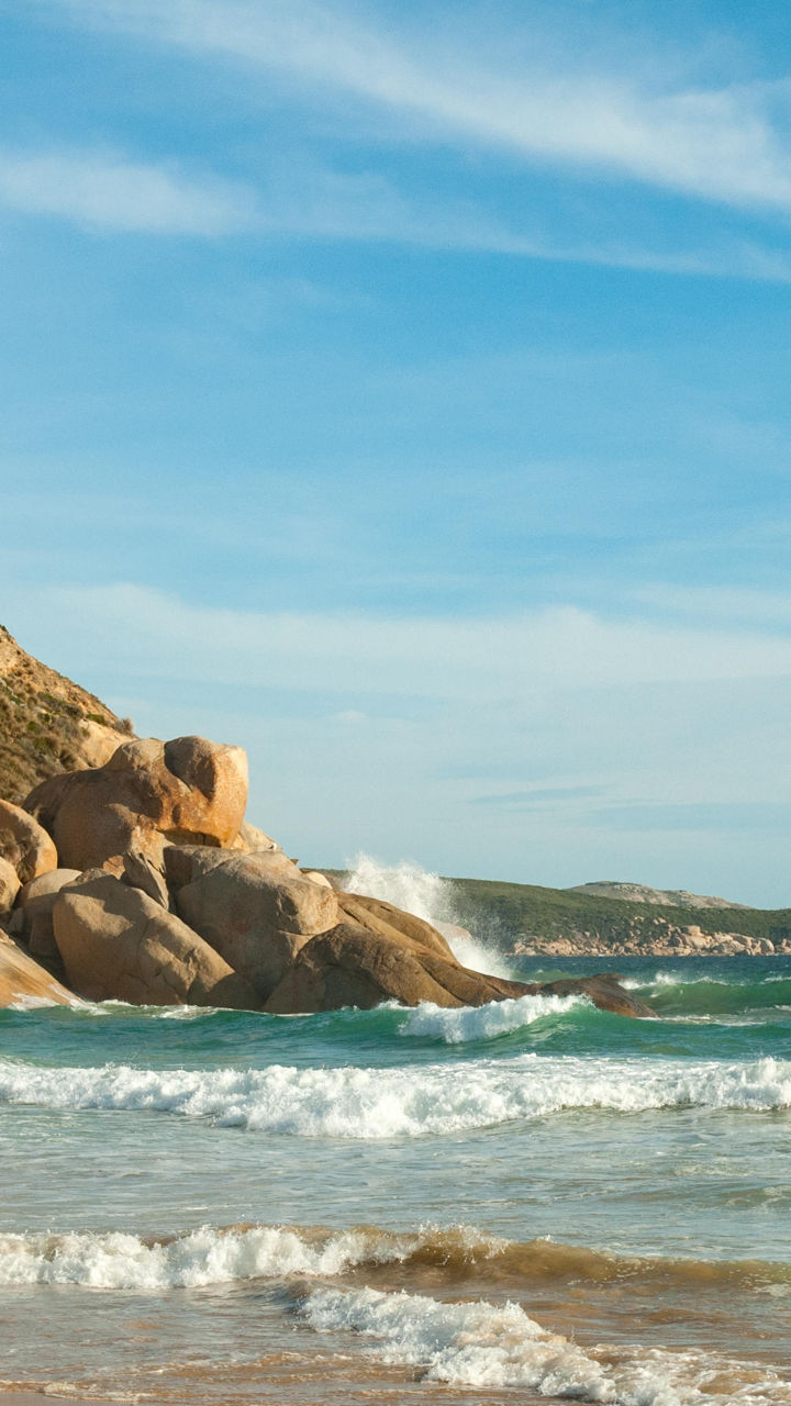 Scenic coastal beach with rocky cliffs