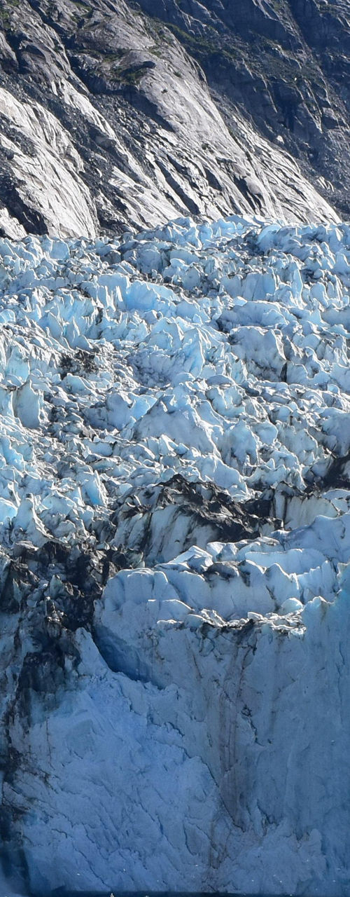 Majestic glacier calving into icy waters