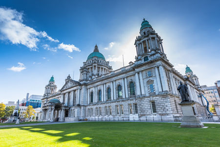Historic Belfast City Hall under blue sky