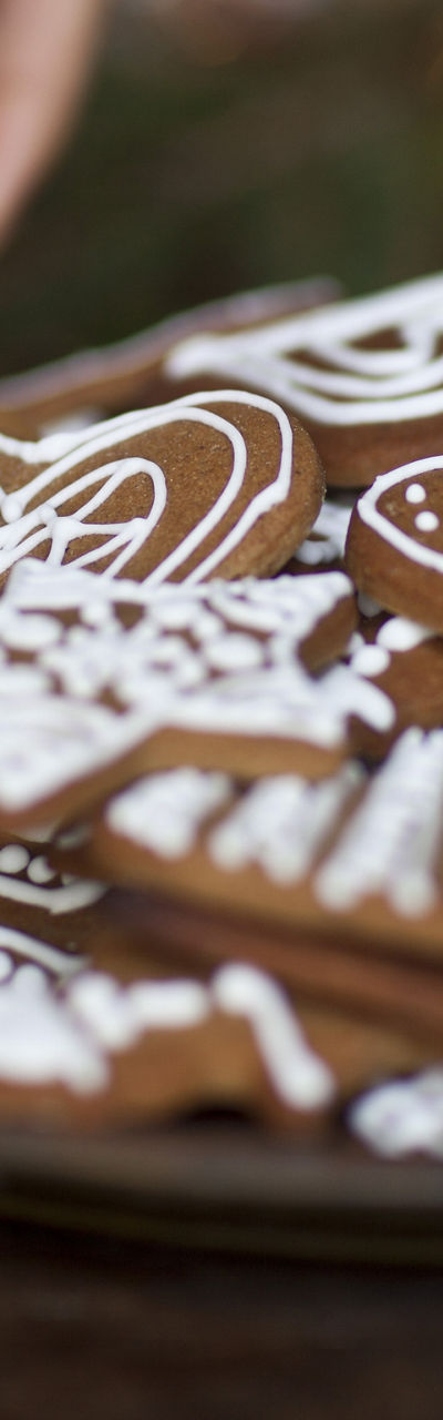 Decorating festive gingerbread cookies on a plate