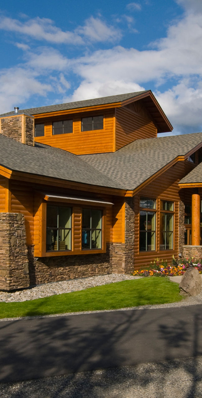 Rustic lodge with wooden exterior in nature