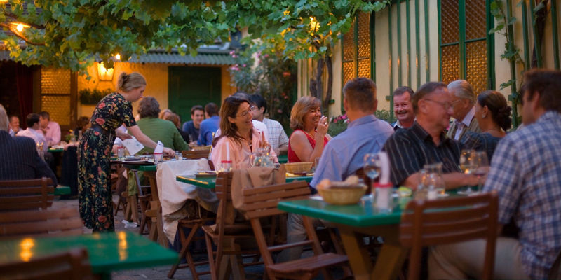 Outdoor dining in cozy garden setting