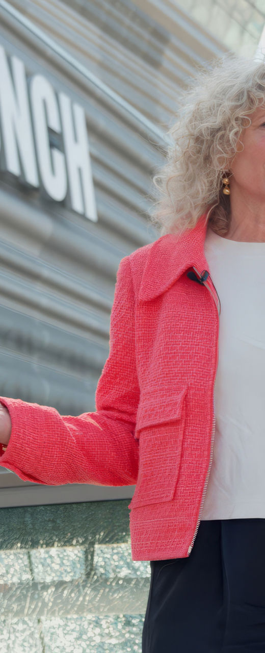 Woman in red jacket near Munch Museum
