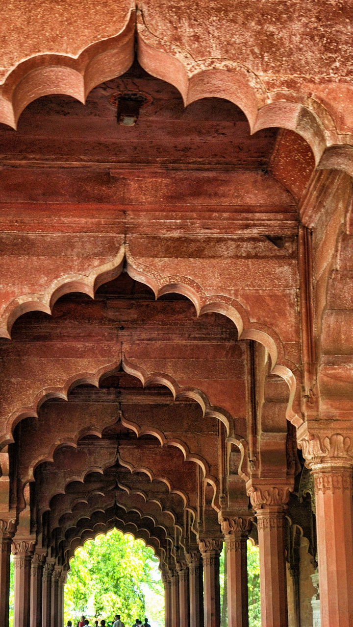Historic sandstone arches in outdoor setting