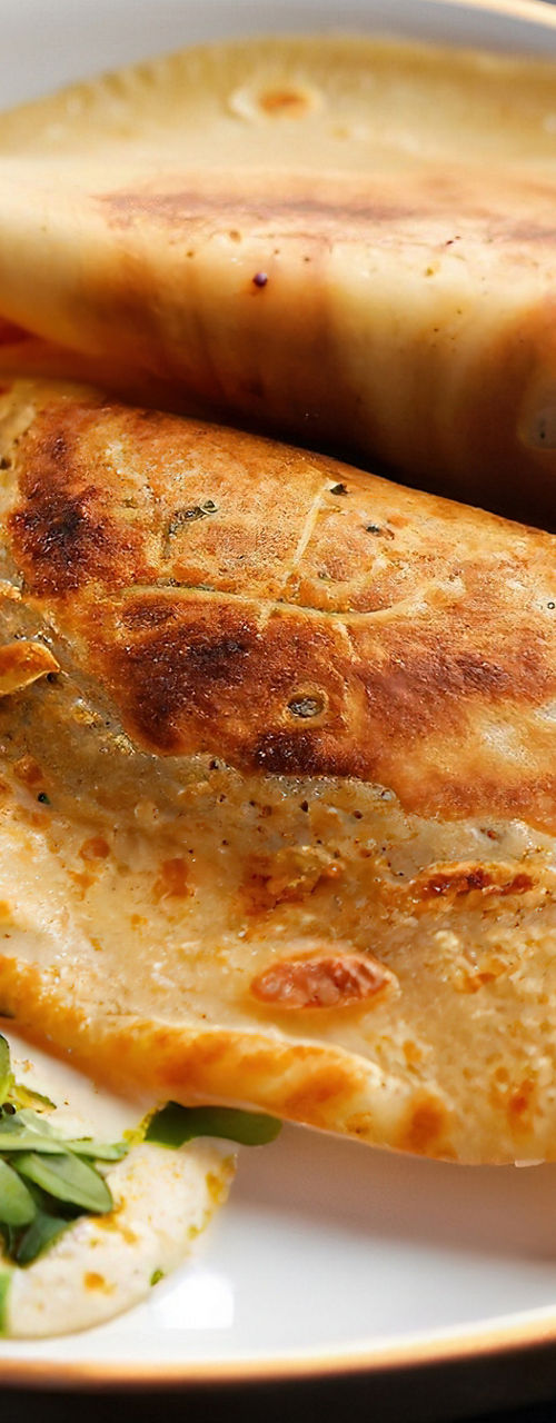 South Indian breakfast with dosa and chutneys