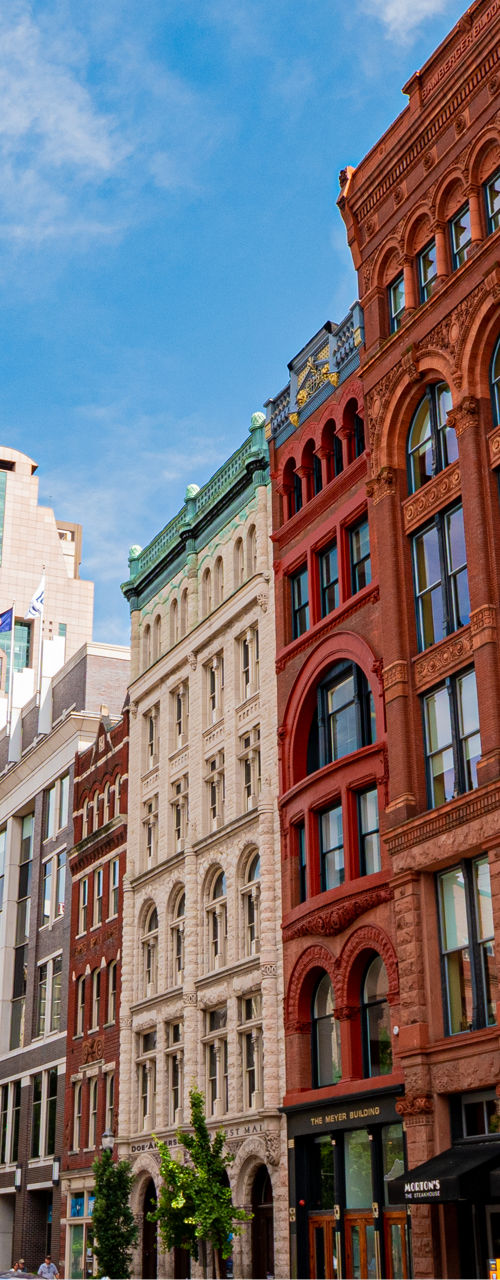 Historic urban street with clock and buildings