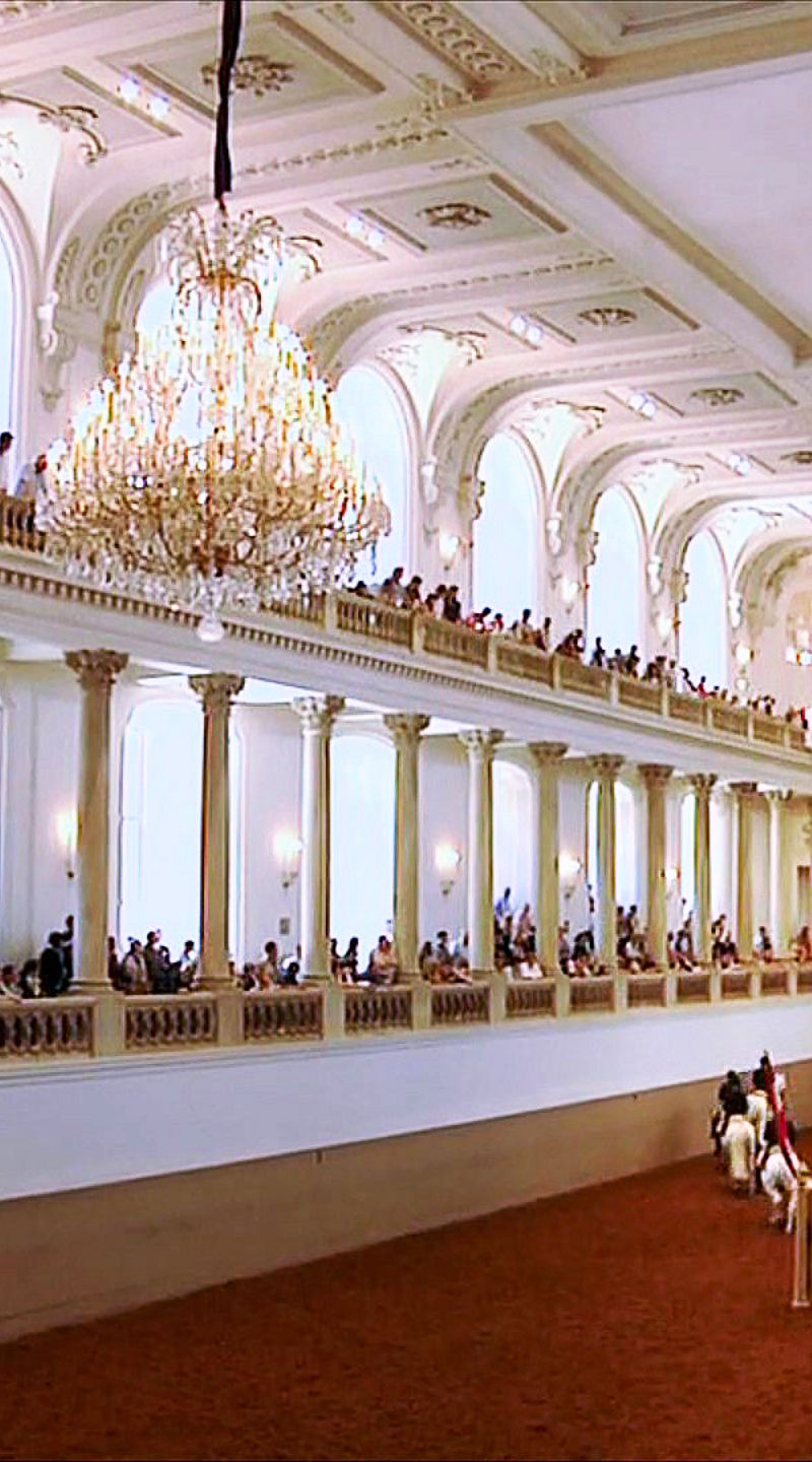 Equestrian performance in grand indoor arena