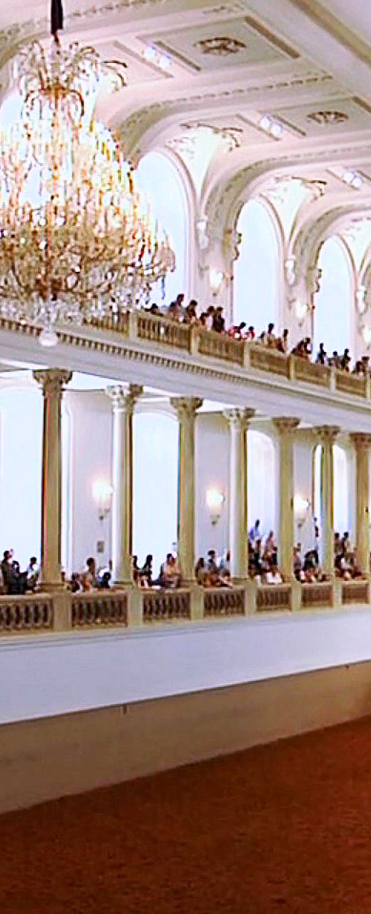Equestrian performance in grand indoor arena