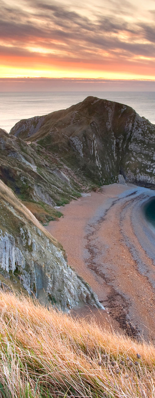 Durdle Door coastal arch at sunset