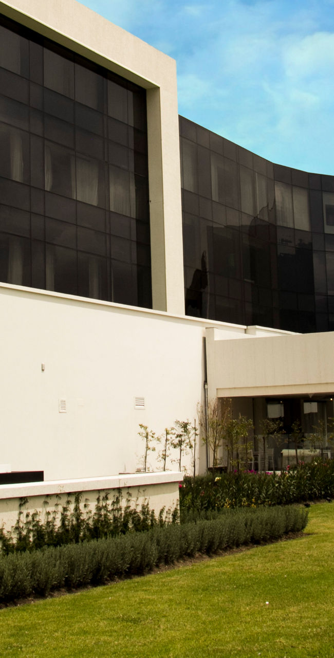 Modern EB Hotel exterior with glass facade
