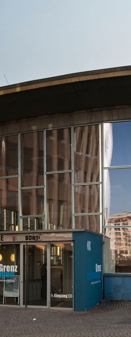 Modern glass building with curved roof