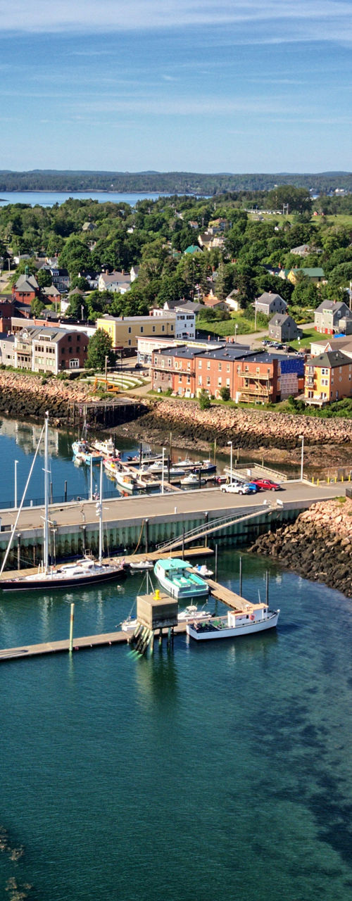 Scenic coastal town with marina view