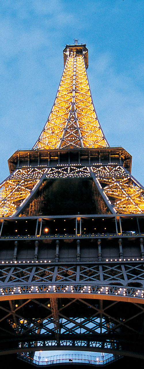Illuminated Eiffel Tower at dusk