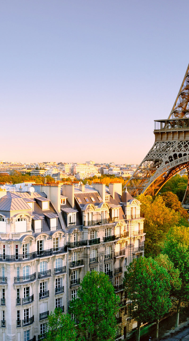 Eiffel Tower with Parisian Architecture at Sunset