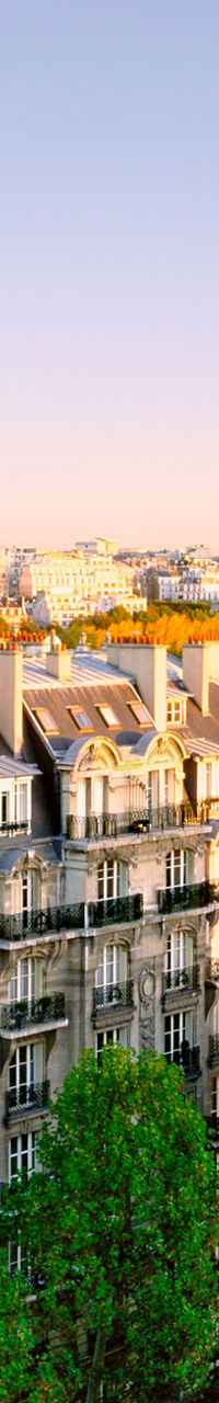Eiffel Tower with Parisian Architecture at Sunset
