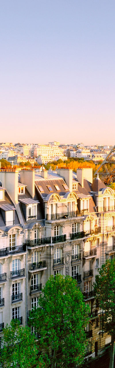 Eiffel Tower with Parisian Architecture at Sunset
