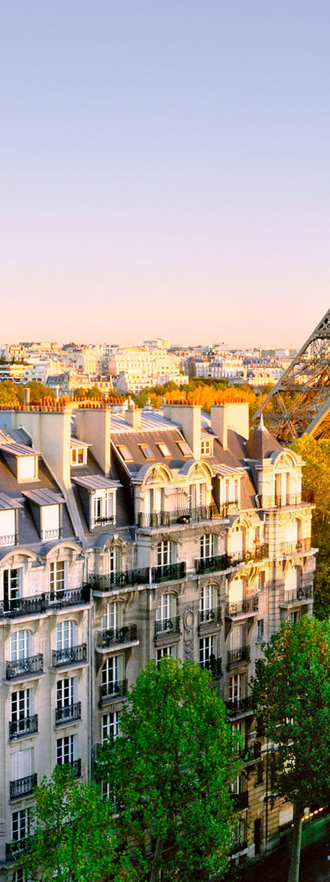 Eiffel Tower with Parisian Architecture at Sunset