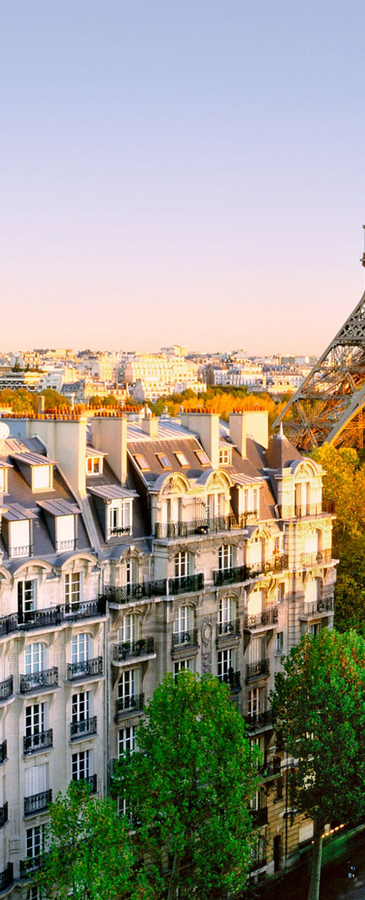 Eiffel Tower with Parisian Architecture at Sunset