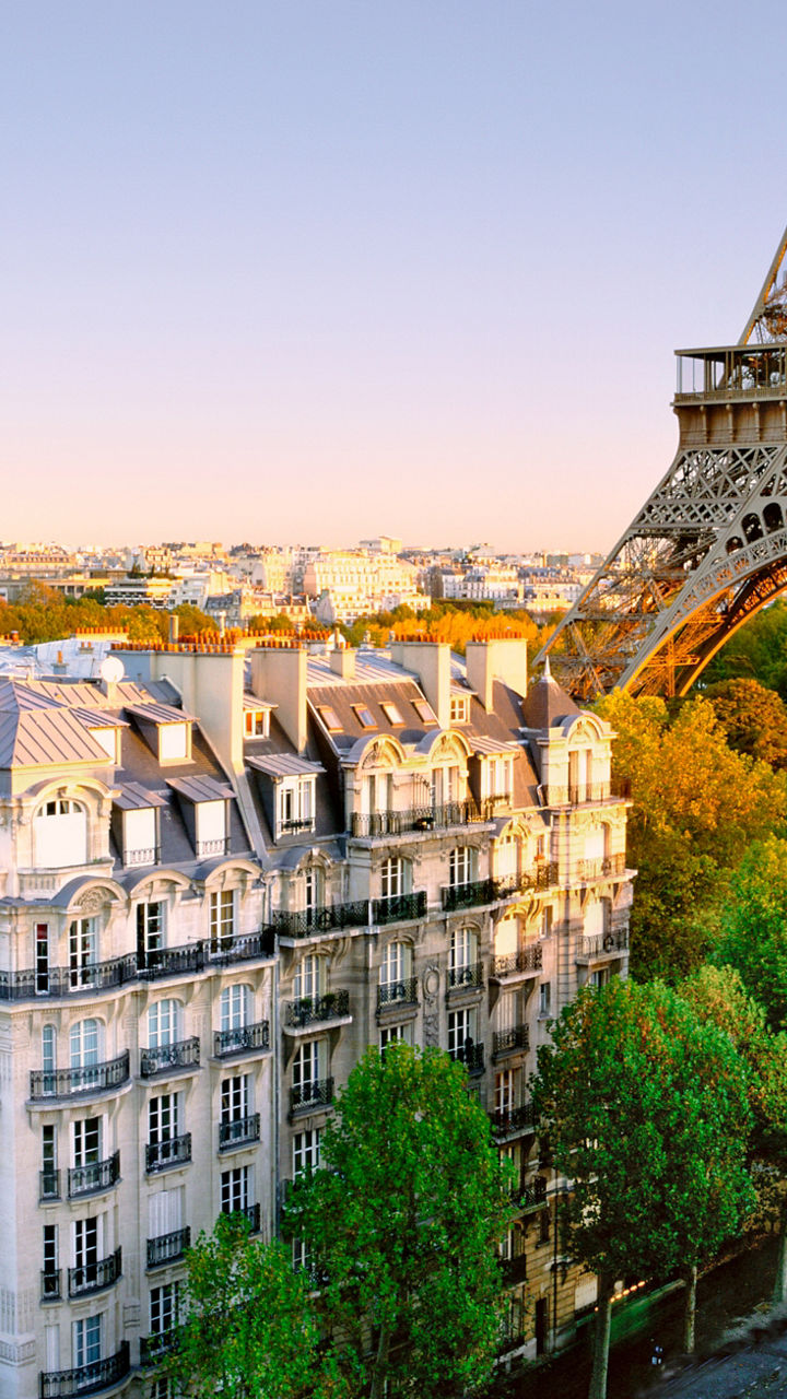 Eiffel Tower with Parisian Architecture at Sunset
