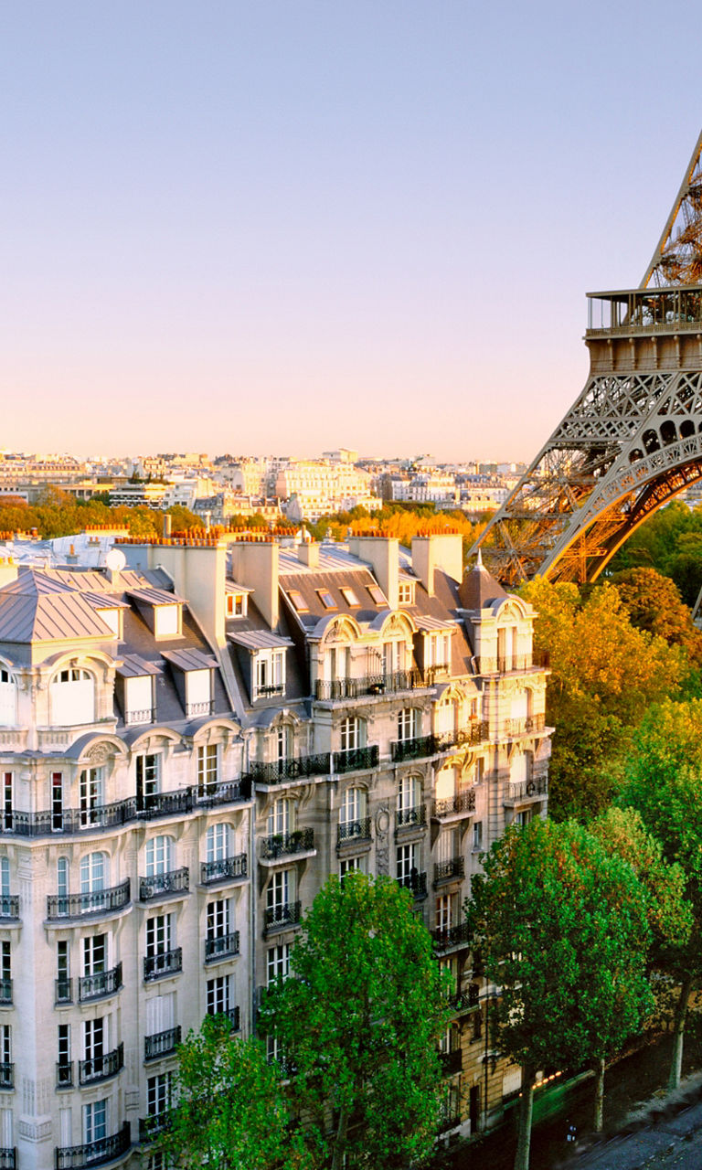 Eiffel Tower with Parisian Architecture at Sunset