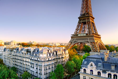 Eiffel Tower with Parisian Architecture at Sunset