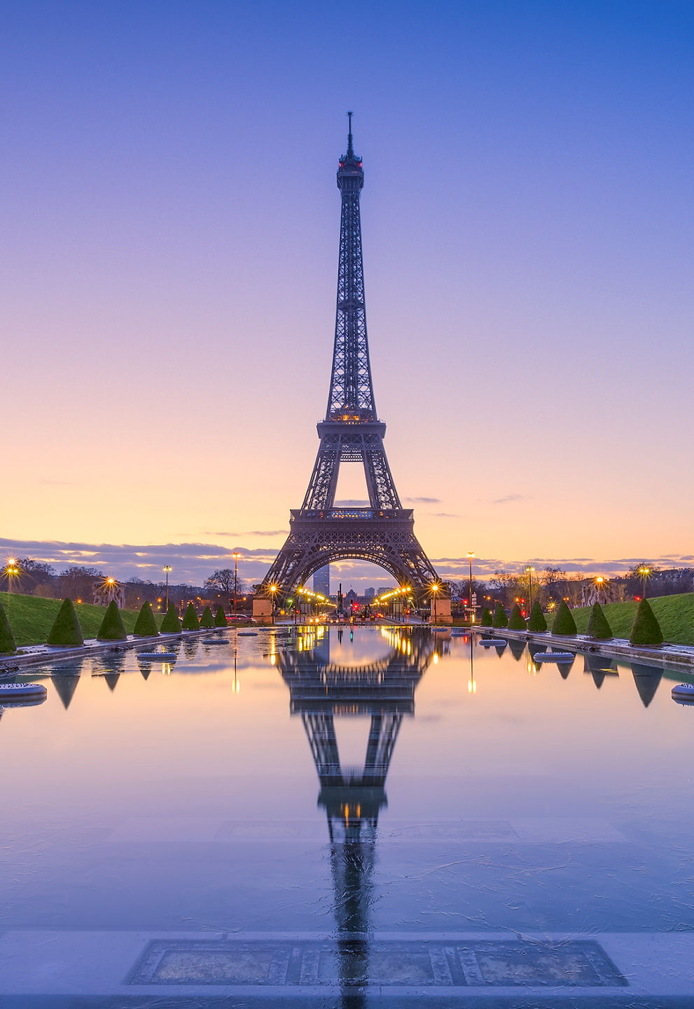 Eiffel Tower at sunrise with reflection