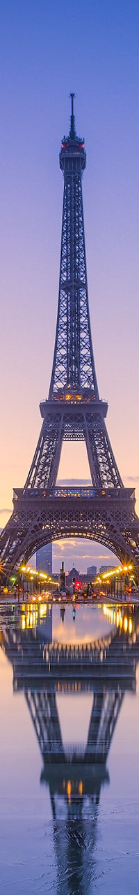 Eiffel Tower at sunrise with reflection