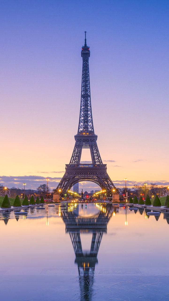 Eiffel Tower at sunrise with reflection