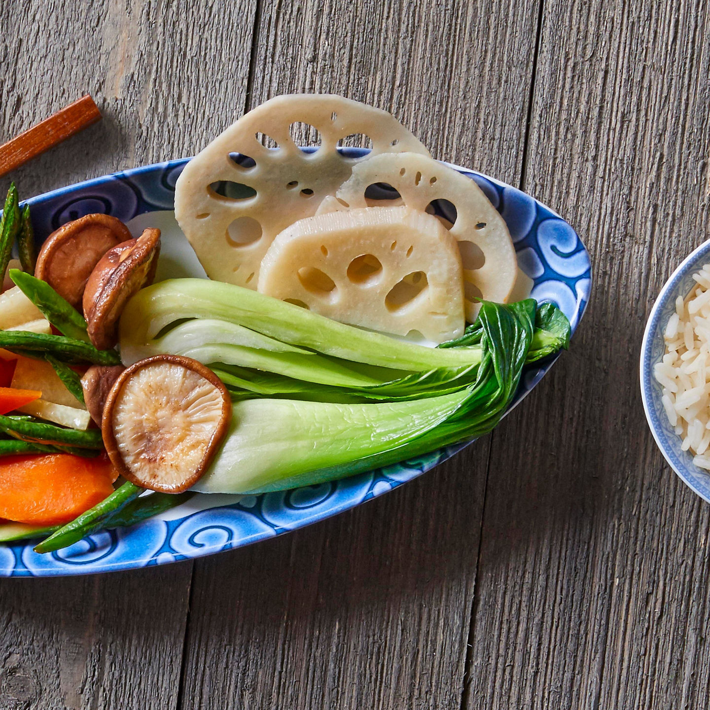 Vegetable platter with rice on wooden table