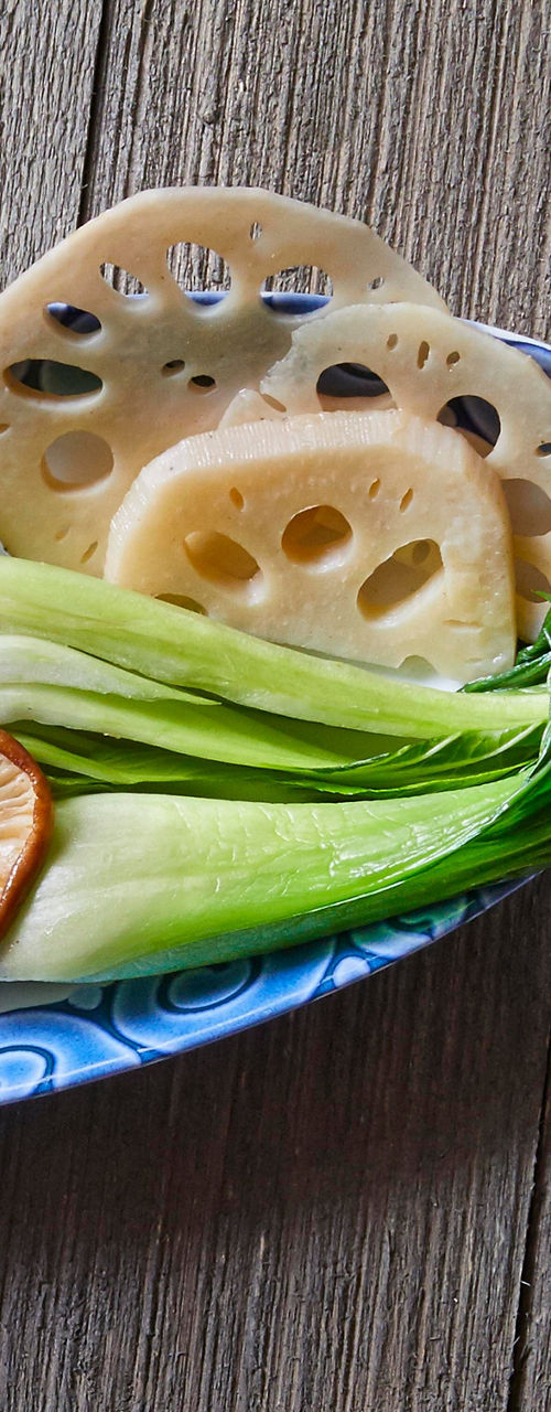 Vegetable platter with rice on wooden table