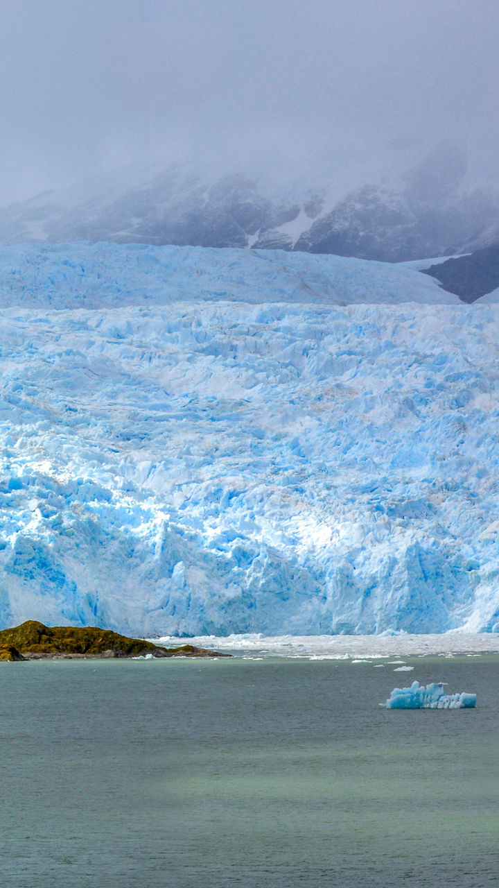 Majestic glacier with icy blue hues
