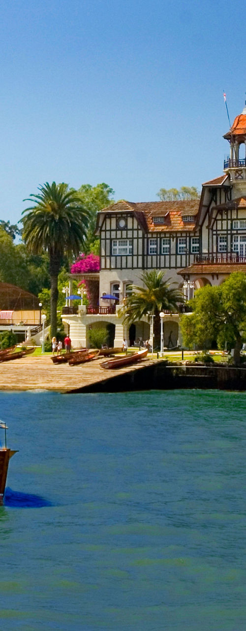 Scenic riverside view with wooden boat