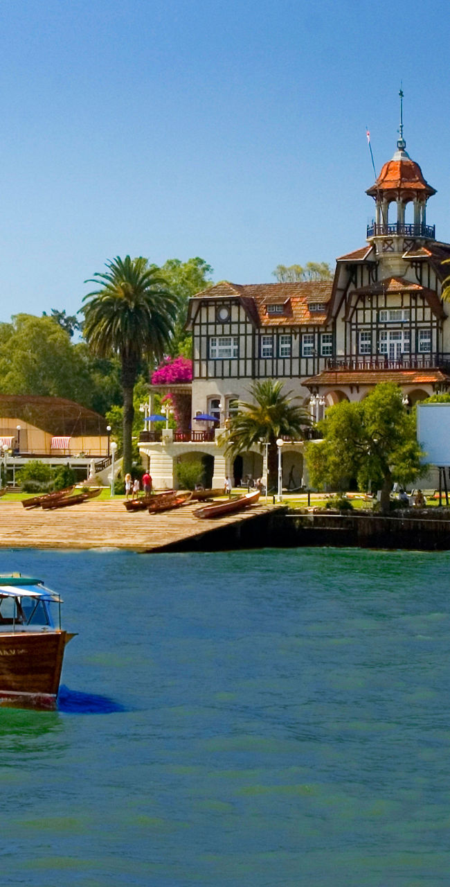 Scenic riverside view with wooden boat