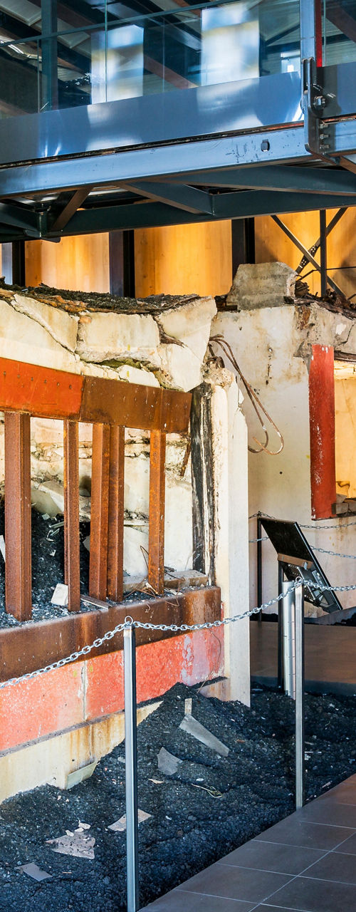 Historical exhibit of preserved ruins indoors