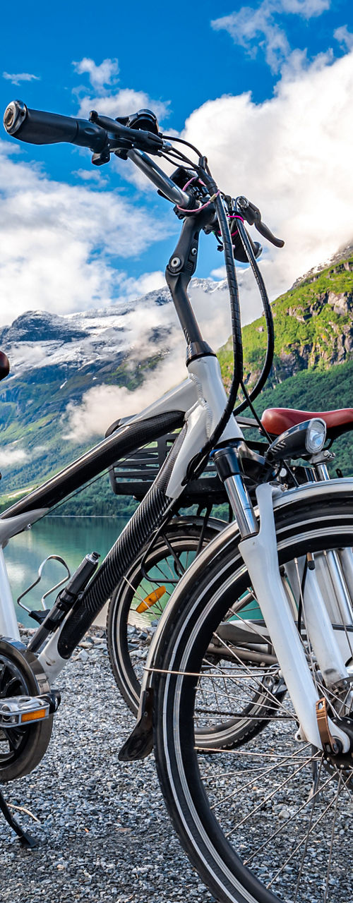 Electric bikes by scenic mountain lake