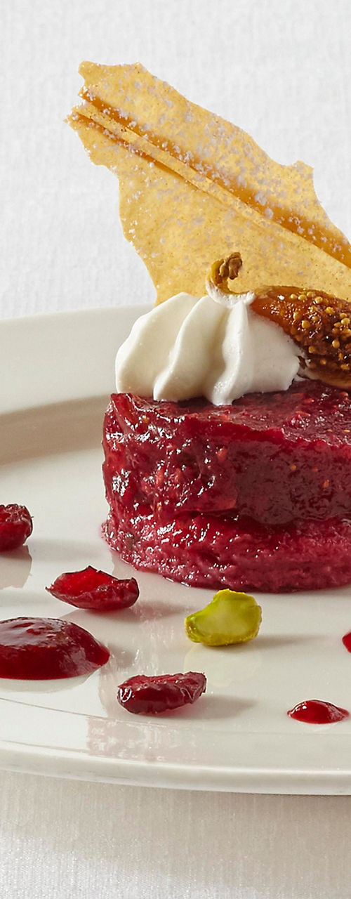 Elegant dessert with berries and cream