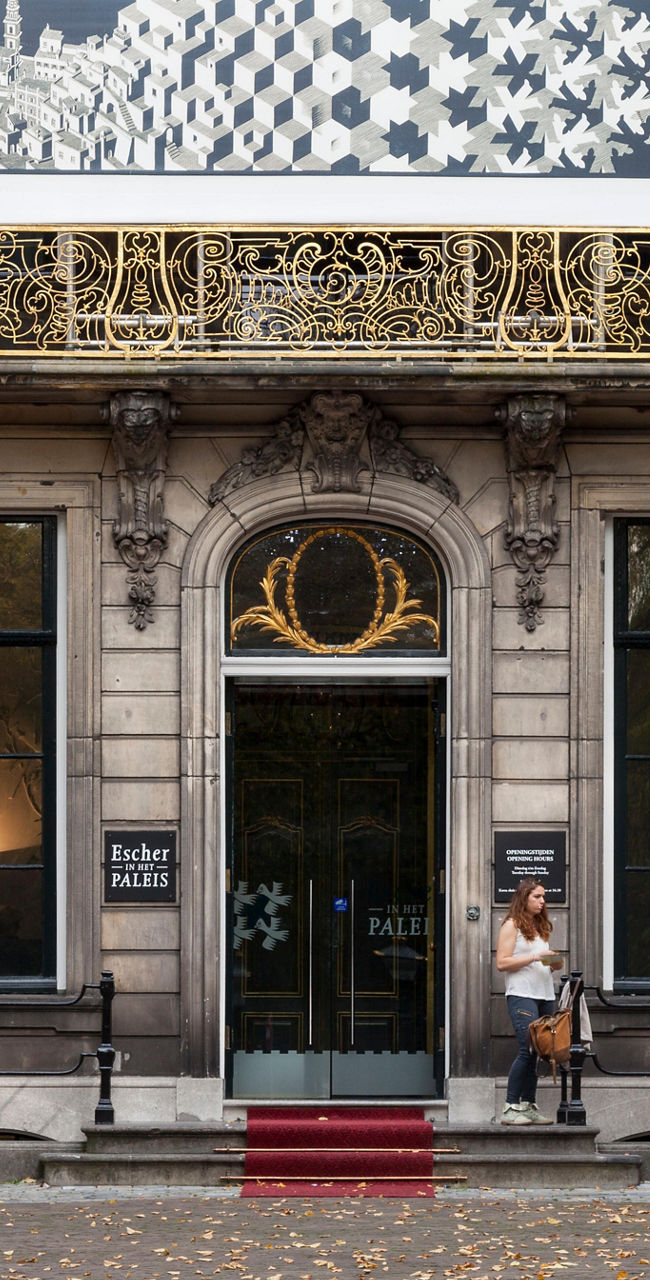 Escher Museum facade with banners