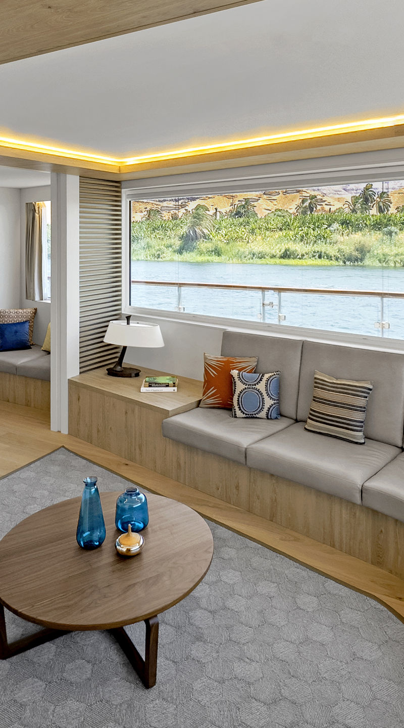 Modern yacht interior with scenic river view