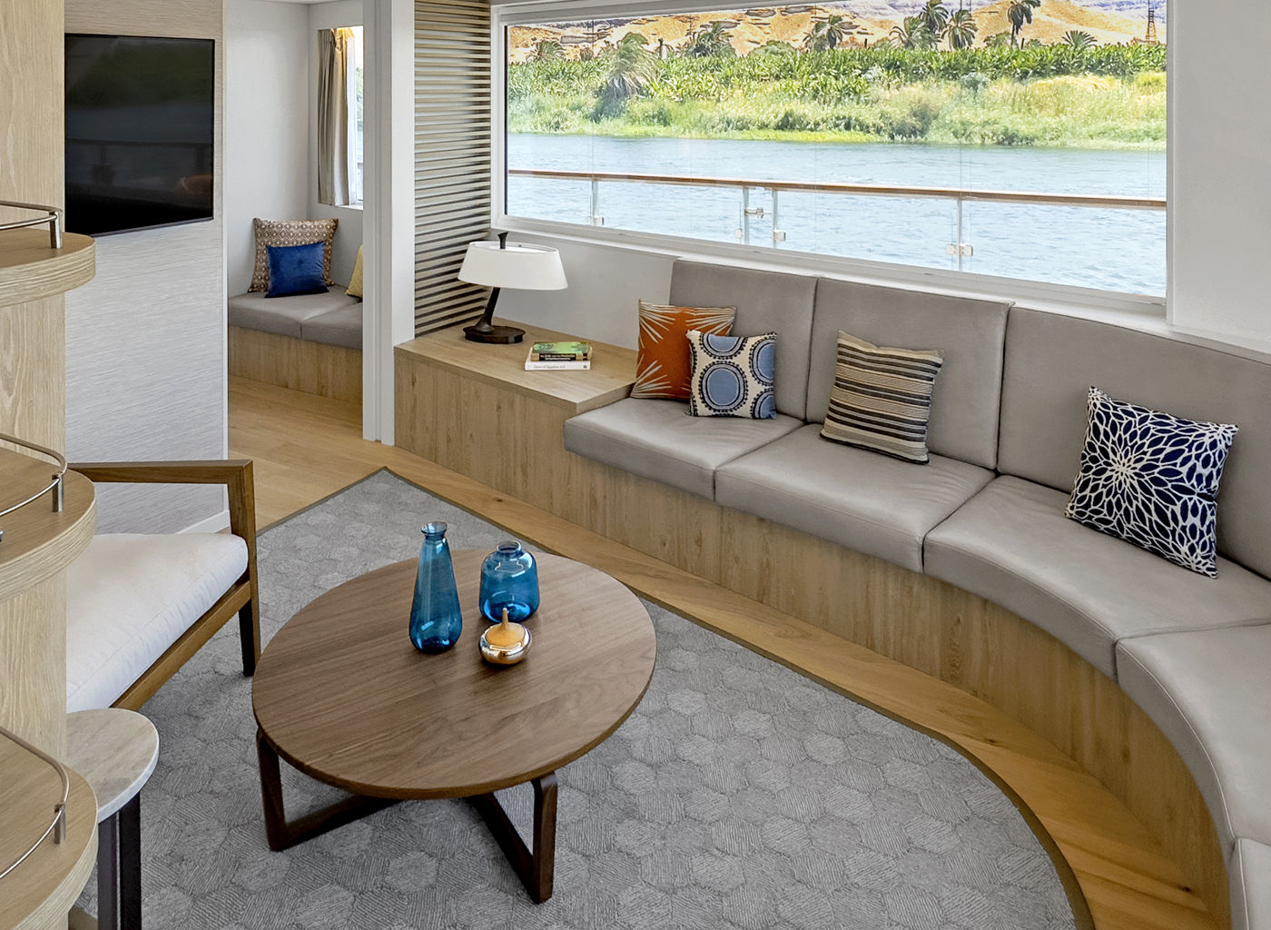 Modern yacht interior with scenic river view