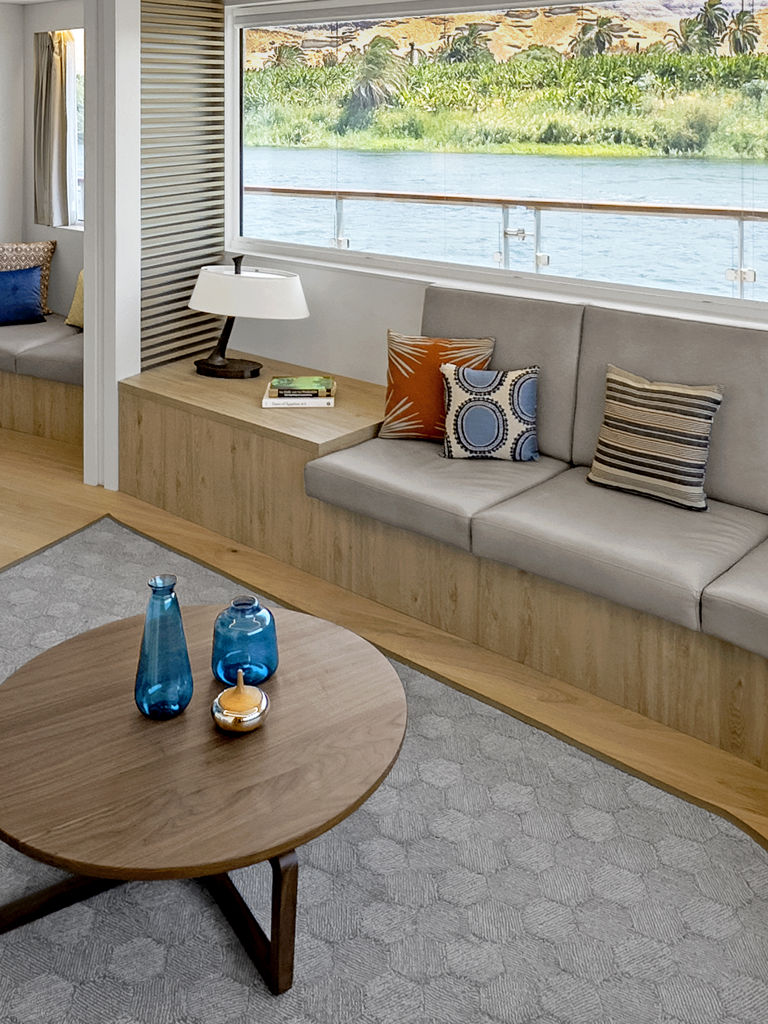 Modern yacht interior with scenic river view