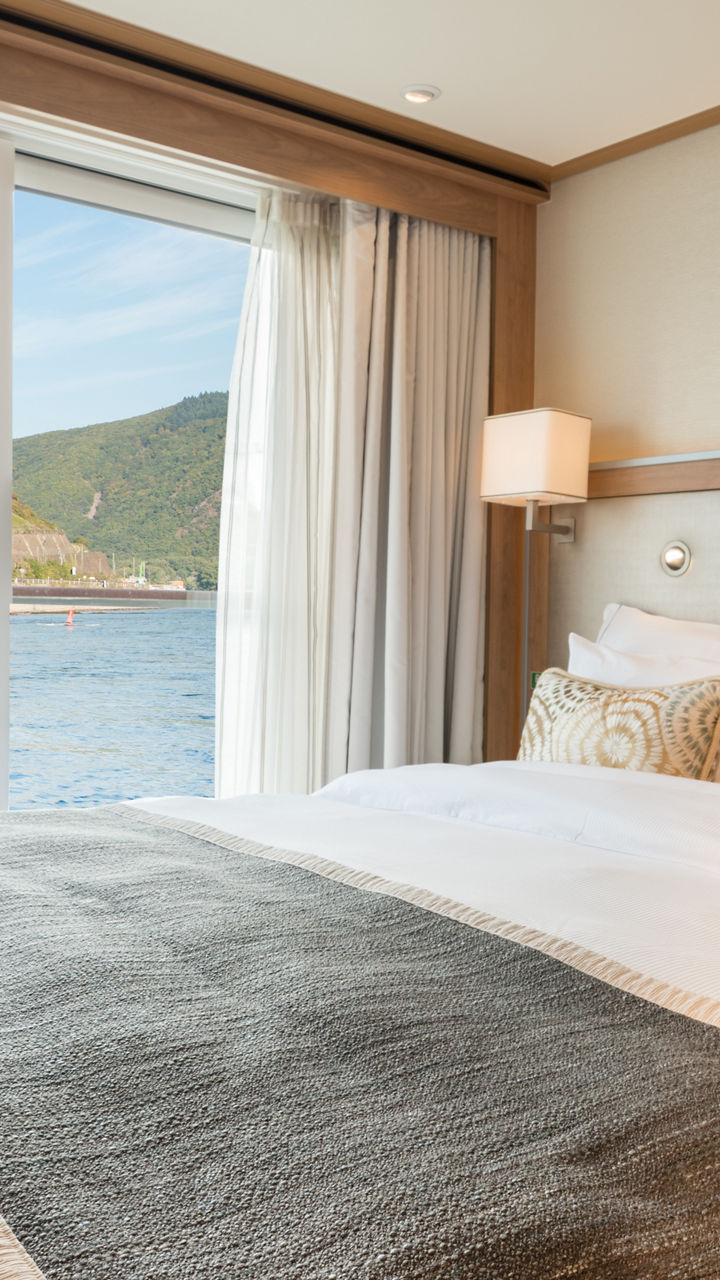 Luxury river view bedroom with large window