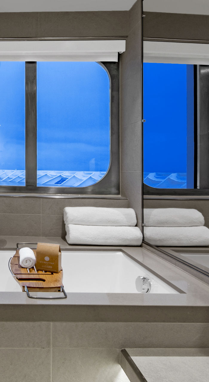 modern bathroom with ocean view window