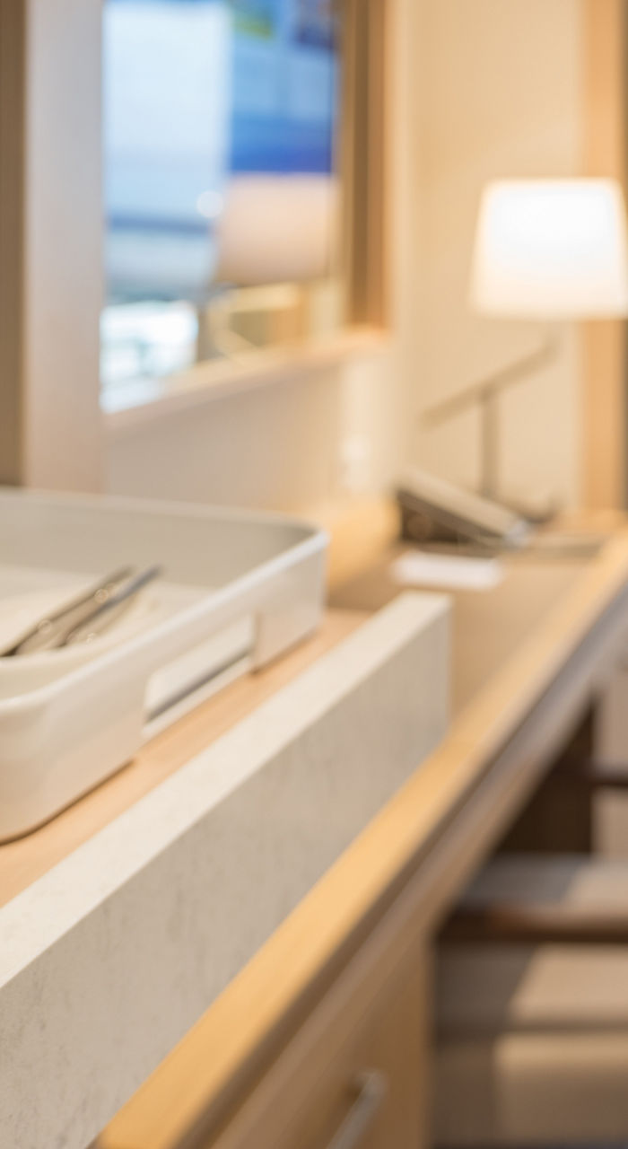 modern coffee machine in cozy hotel room