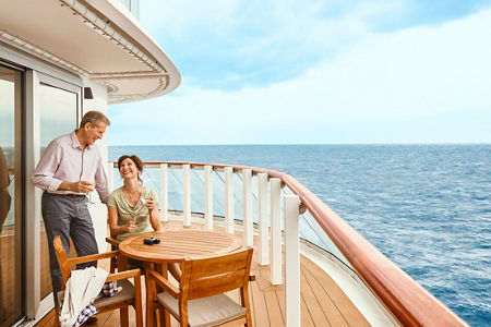 Couple enjoying cruise ship balcony view
