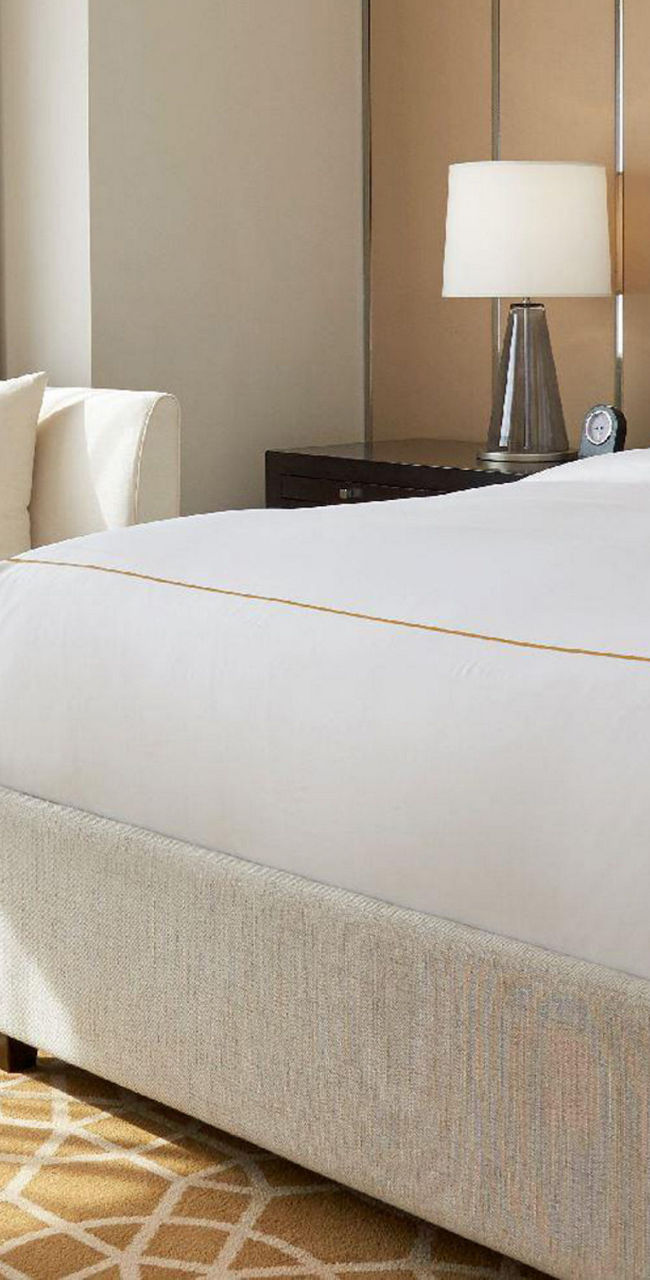 Modern hotel room with beige accents
