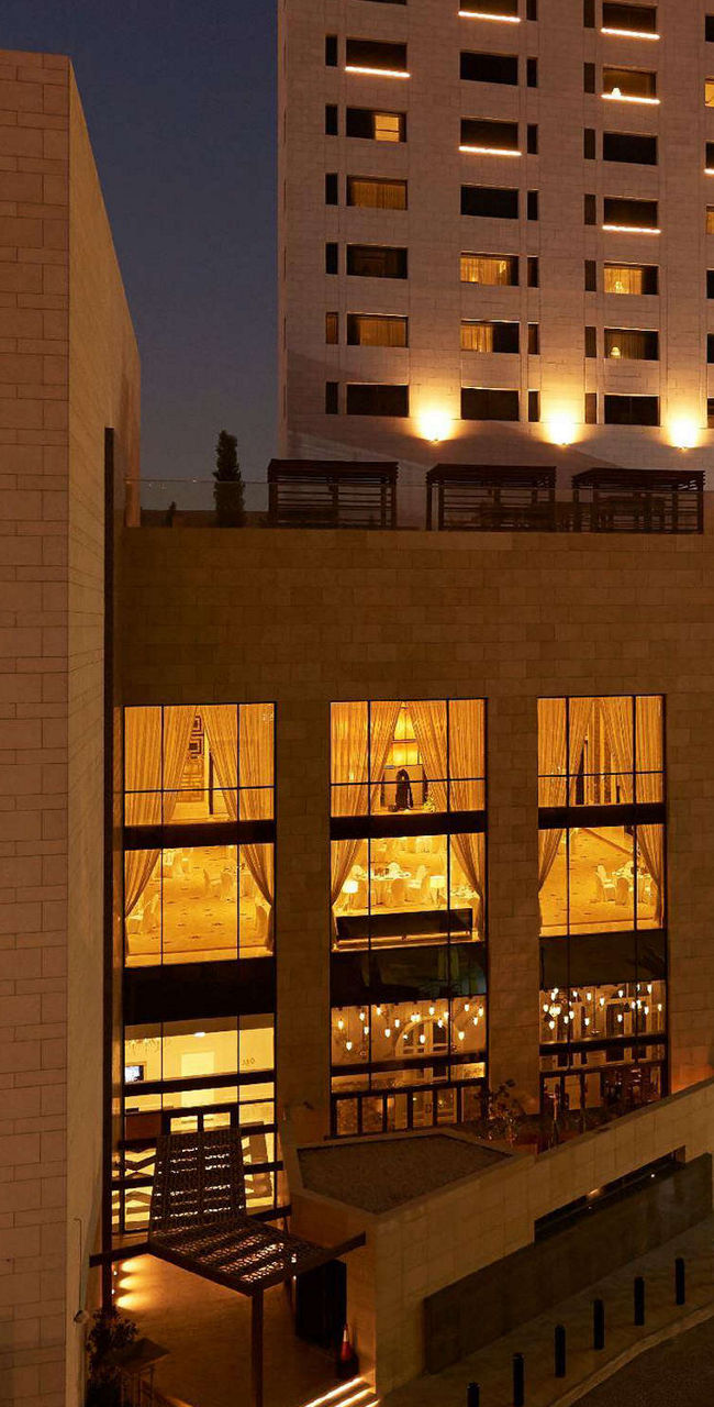 Luxury Hotel Exterior at Night