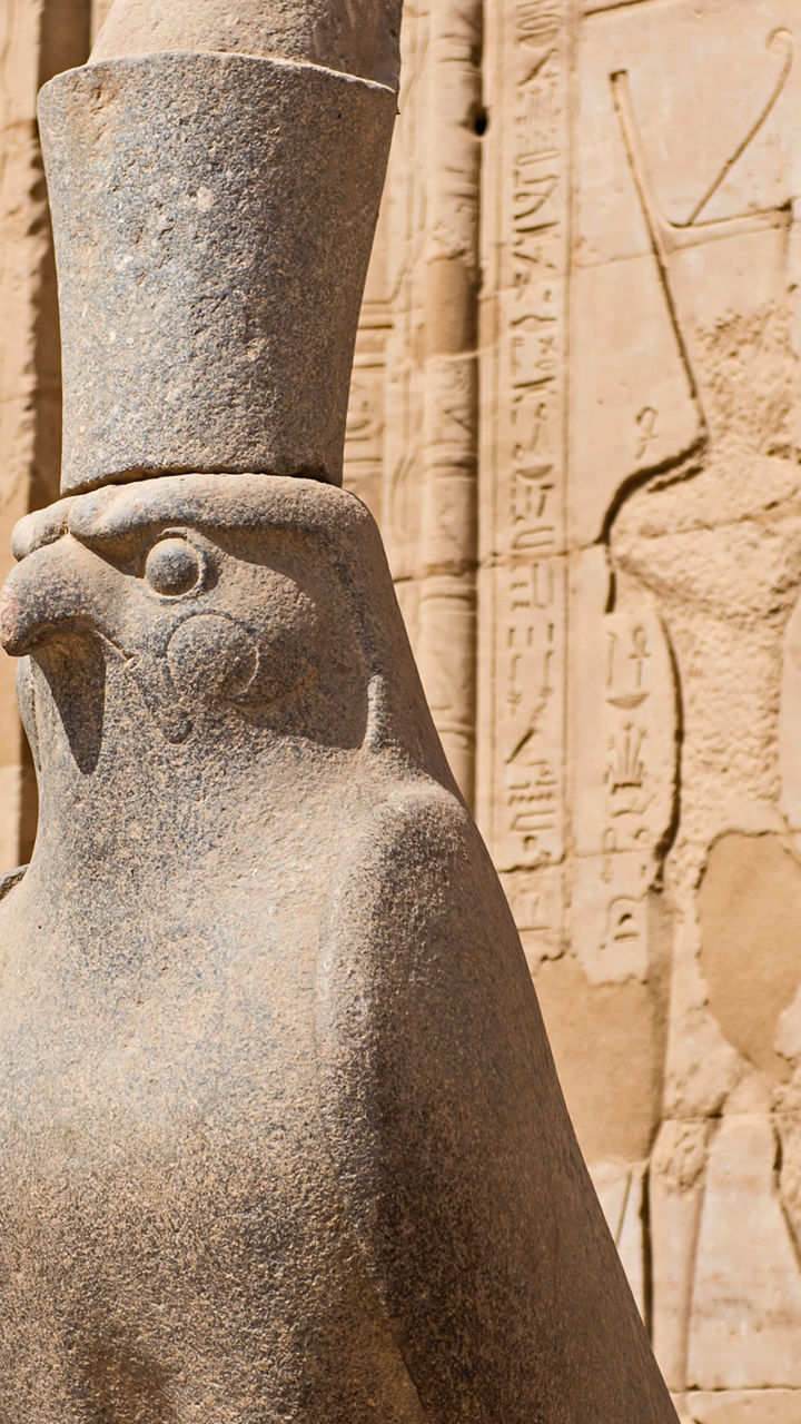 Ancient Egyptian falcon statue at temple