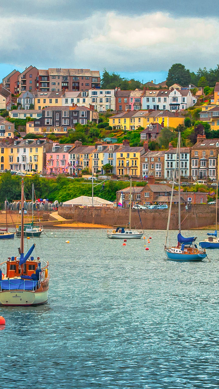 Colorful coastal town with docked boats
