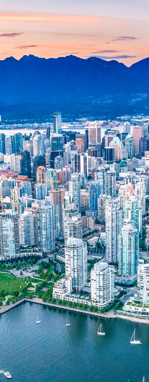 Aerial view of Vancouver cityscape at sunset