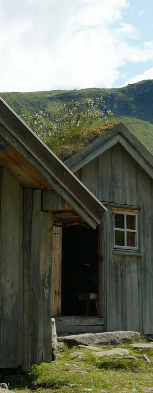 Rustic cabins in scenic mountain valley